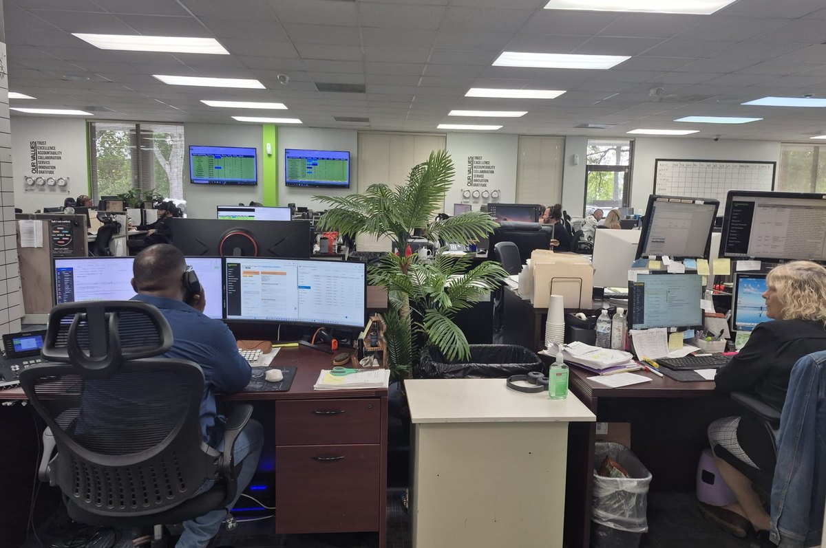 The Traffik Boosters team at work in the office, coordinating client growth through Starz-OS